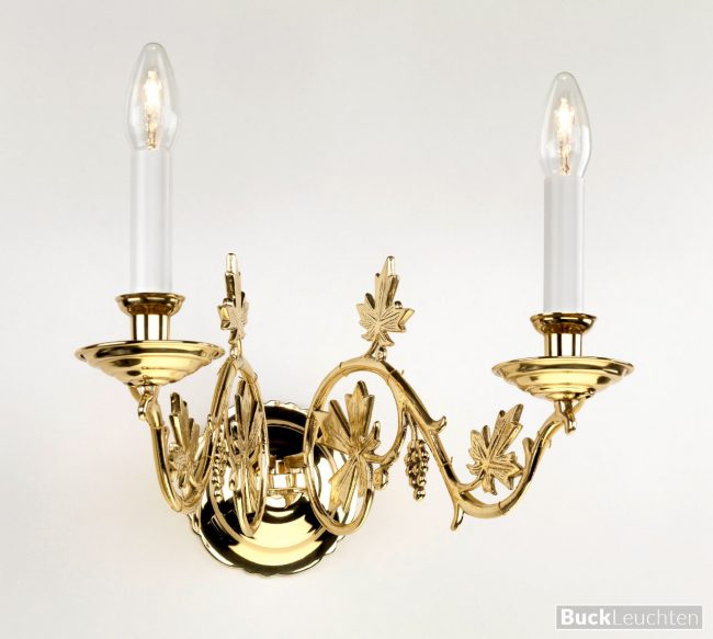 9_50_02_-historismus_wandleuchte__2_arme_reiche_armverzierungen_2_x_e14_h_ca._23_cm_b_ca._33_cm_a_ca._37cm_messingguss_hochglanz_poliert